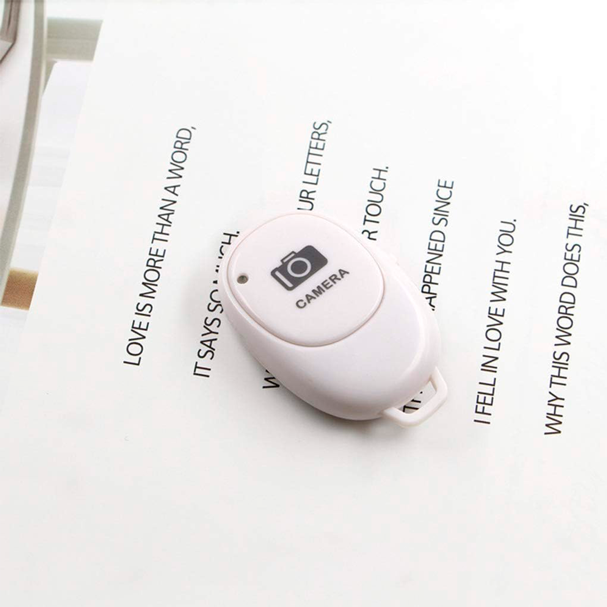 Disparador Bluetooth blanco con distancia de conexión de 10 metros